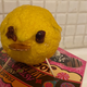 Very ugly lemon piglet with coin in mouth